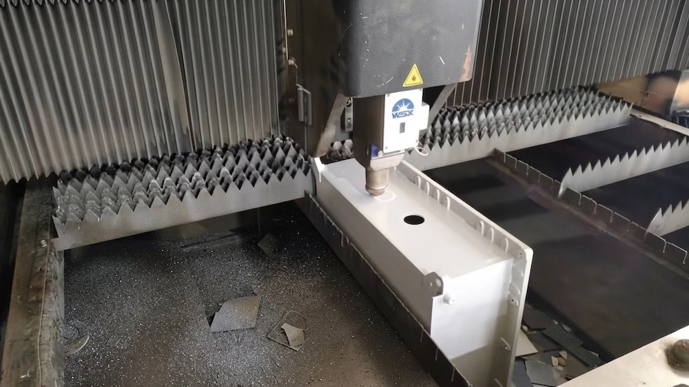 Machining equipment with a metal component positioned for processing